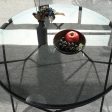 Round Black Glass Coffee Table- Model Canes For Discount